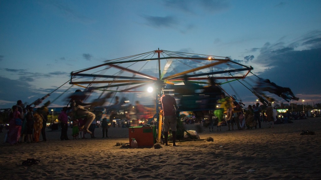 Beach swing carousel at twilight